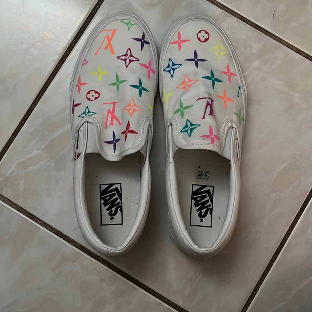 LV white slip on vans